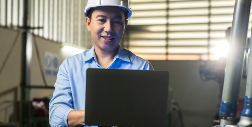 portrait-asian-emgineer-male-female-technician-safty-uniform-standing-turn-around-look-camera-laugh-smile-with-cheerful-confident-machinery-factory-workplace-background